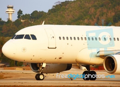 Airplane On Runway Stock Photo