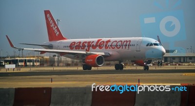 Airplane Taxiing In A Airport Stock Photo