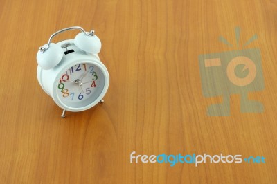 Alarm Clock Color Number On Wooden Table Stock Photo