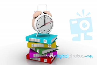 Alarm Clock Near Stack Of Books Over White Stock Image