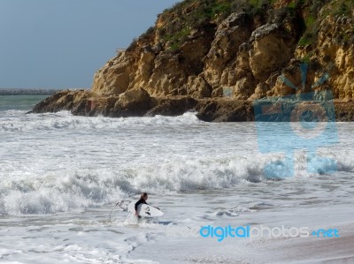 Albufeira, Southern Algarve/portugal - March 10 : View Of A Surf… Stock Photo