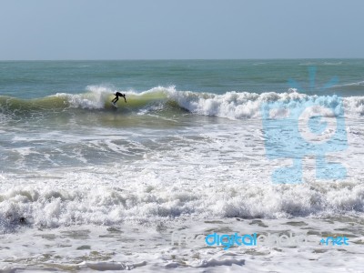 Albufeira, Southern Algarve/portugal - March 10 : View Of A Surf… Stock Photo