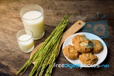 Almond Cookies With Rice Milk And Ear Of Rice  On Old Wooden Tab… Stock Photo