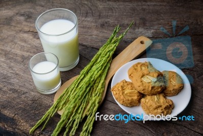 Almond Cookies With Rice Milk And Ear Of Rice  On Old Wooden Tab… Stock Photo