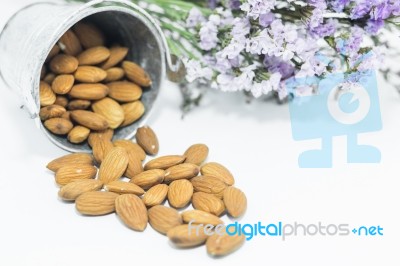 Almond Grains On White Clean Table Stock Photo