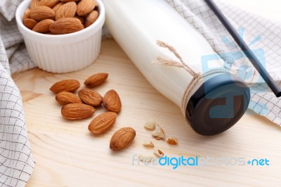 Almond Milk In Bottle With Almond Stock Photo