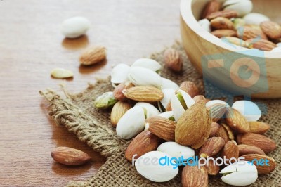 Almond Mixed On Sack Stock Photo