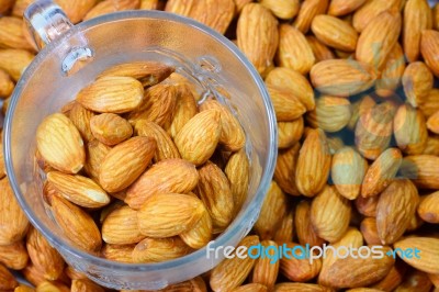 Almonds In Glass Mug Stock Photo