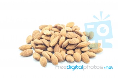 Almonds In Sack Isolated On White Background Stock Photo