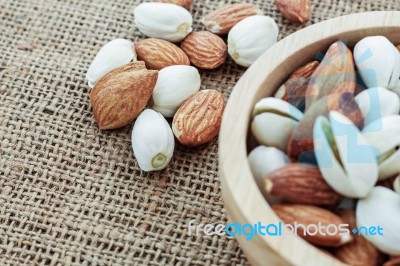 Almonds On Sack Stock Photo