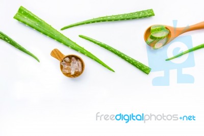 Aloe Vera Fresh Leaves With Aloe Vera Gel On Wooden Spoon Stock Photo