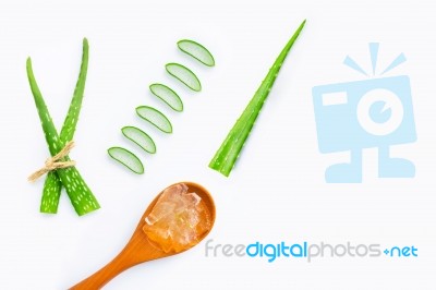 Aloe Vera Fresh Leaves With Aloe Vera Gel On Wooden Spoon Stock Photo