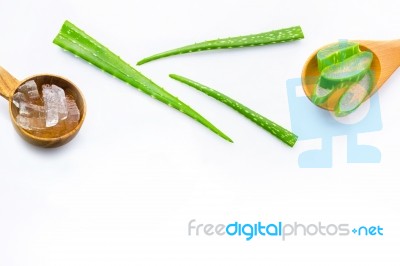 Aloe Vera Fresh Leaves With Aloe Vera Gel On Wooden Spoon Stock Photo