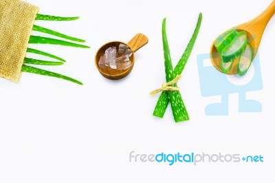 Aloe Vera Fresh Leaves With Aloe Vera Gel On Wooden Spoon Stock Photo