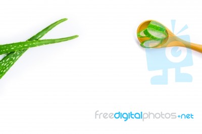 Aloe Vera Fresh Leaves With Aloe Vera Gel On Wooden Spoon Stock Photo