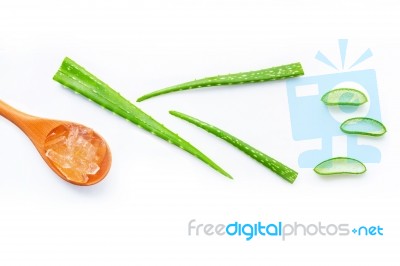 Aloe Vera Fresh Leaves With Aloe Vera Gel On Wooden Spoon Stock Photo