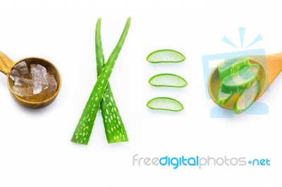 Aloe Vera Fresh Leaves With Aloe Vera Gel On Wooden Spoon Stock Photo