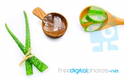 Aloe Vera Fresh Leaves With Aloe Vera Gel On Wooden Spoon Stock Photo