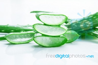 Aloe Vera Fresh Leaves With Slices Aloe Vera Gel. Isolated Over Stock Photo