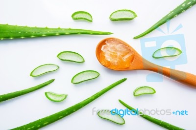 Aloe Vera Fresh Leaves With Slices And Aloe Vera Gel On Wooden S… Stock Photo