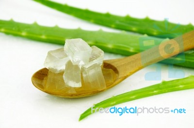 Aloe Vera Gel On Wooden Spoon Stock Photo