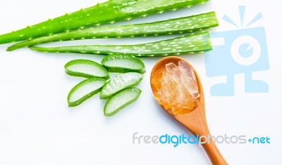 Aloe Vera Sliced Isolated On Brown Wooden Spoon On White Backgro… Stock Photo