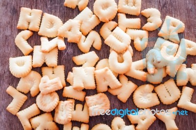 Alphabet Biscuit On Wooden Table Stock Photo