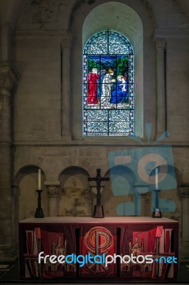 Altar And A Stained Glass Window In Winchester Cathedral Stock Photo