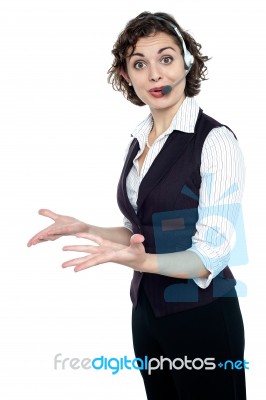 Amazed Pretty Young Female Customer Care Executive Stock Photo