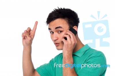 Amazed Young Boy Communicating Stock Photo