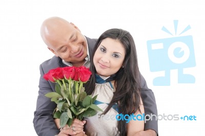 American Young Couple With Bunch Of Roses Stock Photo