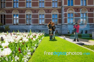 Amsterdam, Netherlands - May 6, 2015: Tourists At The Garden Aro… Stock Photo