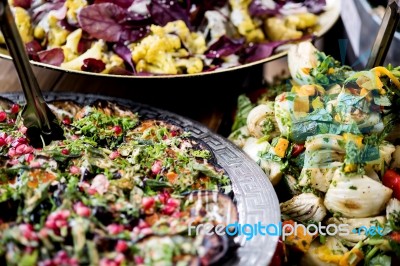 An Assortment Of Salads On A Buffet Table Stock Photo