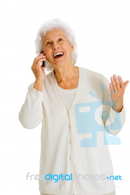 An Old Lady Talking Over Phone Stock Photo