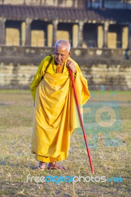 An Unidentified Old Buddhist Female Monk Dressed In Orange Toga Stock Photo