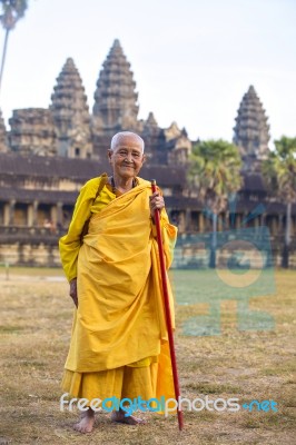 An Unidentified Old Buddhist Female Monk Dressed In Orange Toga Stock Photo