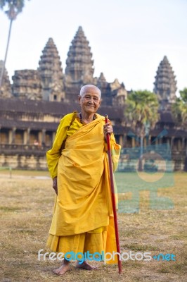 An Unidentified Old Buddhist Female Monk Dressed In Orange Toga Stock Photo