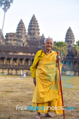 An Unidentified Old Buddhist Female Monk Dressed In Orange Toga Stock Photo