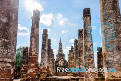 Ancient Pagoda Among The Ruins Pillars Stock Photo