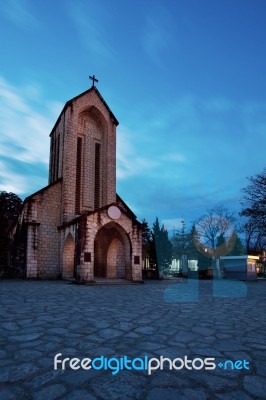 Ancient Stone Church Of Sapa With Blue Night Sky Most Popular Traveling Destination In Sapa Norhtern Of Vietnam Stock Photo