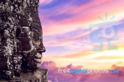 Ancient Stone Faces At Sunset Of Bayon Temple, Angkor Wat, Siam Reap, Cambodia Stock Photo