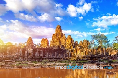 Ancient Stone Faces Of Bayon Temple, Angkor Wat, Siam Reap, Cambodia Stock Photo