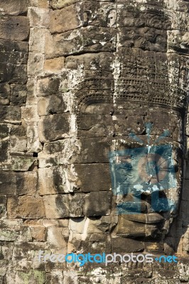 Ancient Stone Faces Of King Jayavarman Vii At The Bayon Temple, Stock Photo