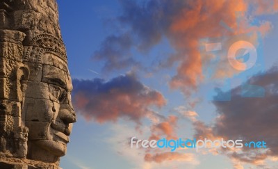 Ancient Stone Faces Of King Jayavarman Vii At The Bayon Temple, Stock Photo