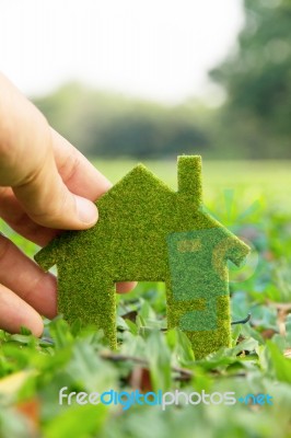 And Holding Eco House Icon Stock Photo