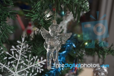 Angel Hanging From Christmas Tree Stock Photo