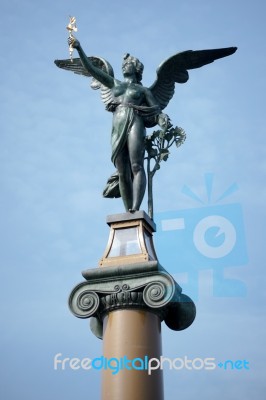 Angel On Top Of A Column On The Cechuv Most Bridge In Prague Stock Photo