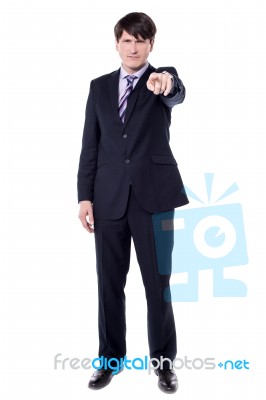 Anger Businessman Pointing To You Stock Photo