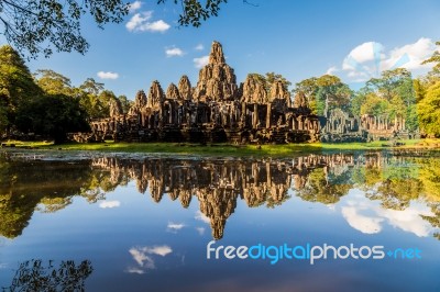 Angkor Wat Temple Reflecting In A Lake Stock Photo