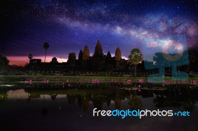 Angkor Wat Temple With Milky Way And Star At Night, Siem Reap In Cambodia Stock Photo